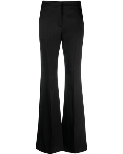 Givenchy Pantalon en coton à coupe évasée - Noir