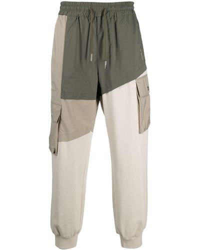 Feng Chen Wang Pantalones de chándal con diseño colour block - Gris