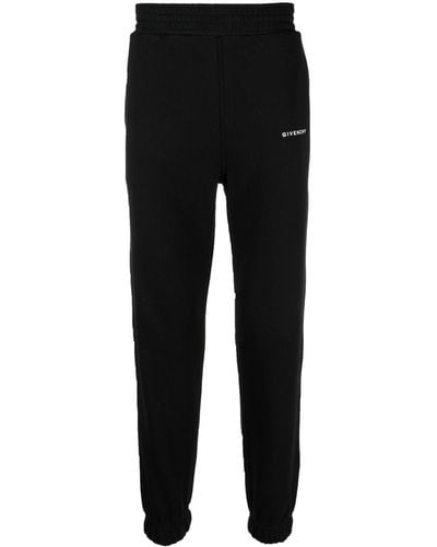 Givenchy Pantalon de jogging à logo imprimé - Noir