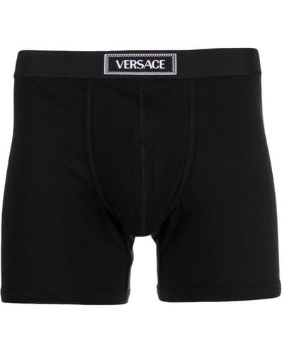 Versace 90s Shorts mit Logo-Bund - Schwarz