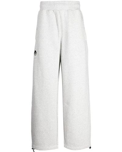 Izzue Pantalon ample à logo appliqué - Blanc