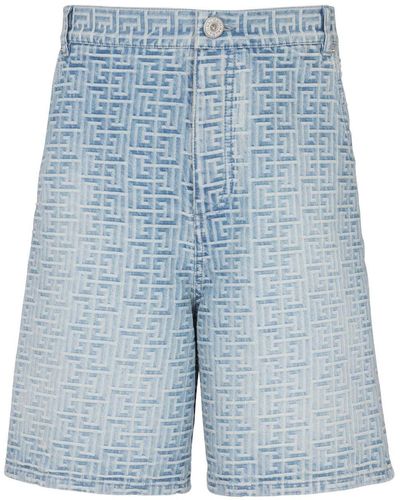 Balmain Short en jean à motif monogrammé - Bleu