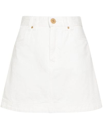 Balmain Minijupe en jean à coupe évasée - Blanc