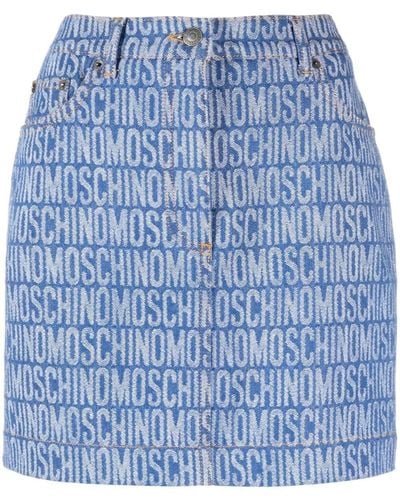 Moschino Minijupe en jean à motif monogrammé - Bleu