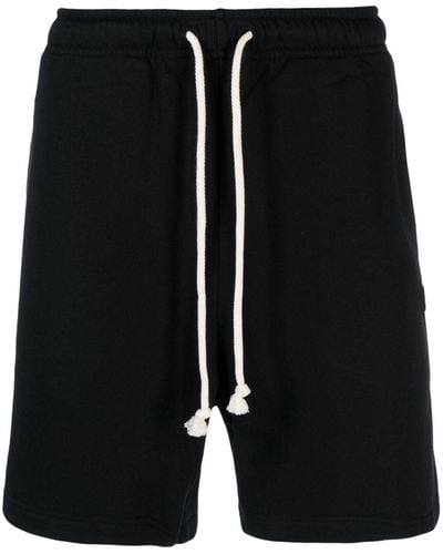 Acne Studios Pantalones cortos de chándal con parche - Negro