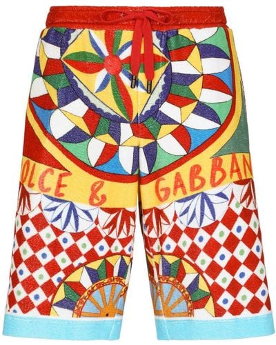 Dolce & Gabbana Terry Jersey Jogging Shorts With Carretto Print - Orange