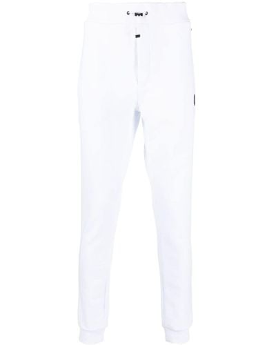 Philipp Plein Pantalon de jogging en coton à plaque logo - Blanc