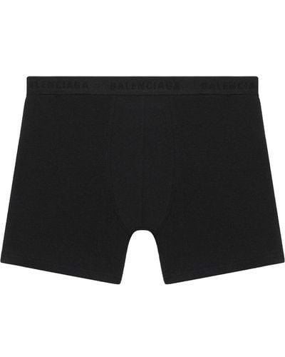 Balenciaga Pantalones cortos con ribete del logo - Negro