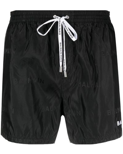 Balmain Short de bain à logo imprimé - Noir