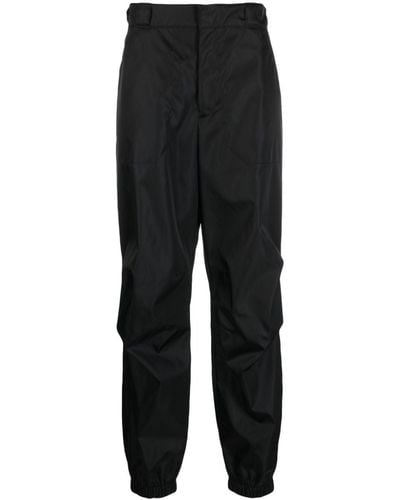 Prada Pantalon de jogging en polyamide recyclé - Noir