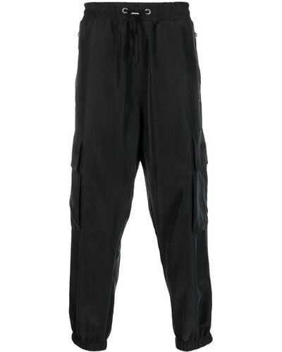 Balmain Pantalones cargo con logo en relieve - Negro