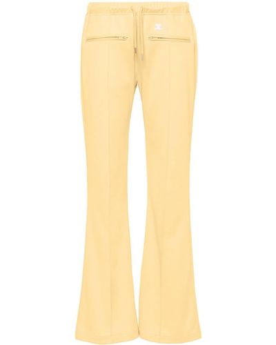 Courreges Pantalones anchos con logo - Amarillo