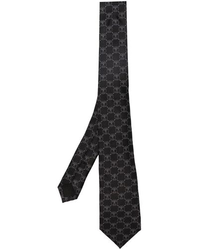 Moschino Cravate en soie à logo brodé - Noir