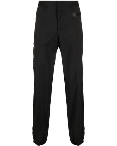 Moschino Klassische Hose mit gummiertem Logo - Schwarz
