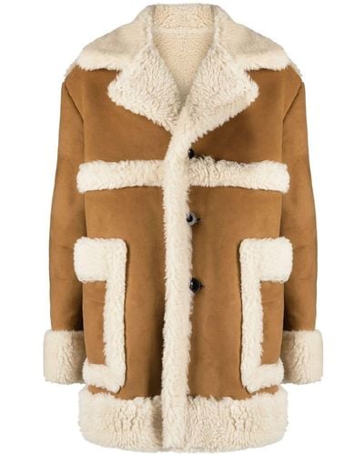 Sacai Manteau boutonné en peau lainée artificielle - Neutre