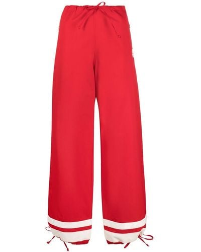 Gucci Pantalones anchos con logo Interlocking G - Rojo