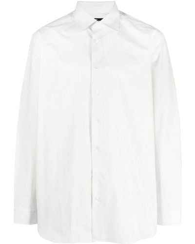 Raf Simons Camisa con eslogan estampado y botones - Blanco