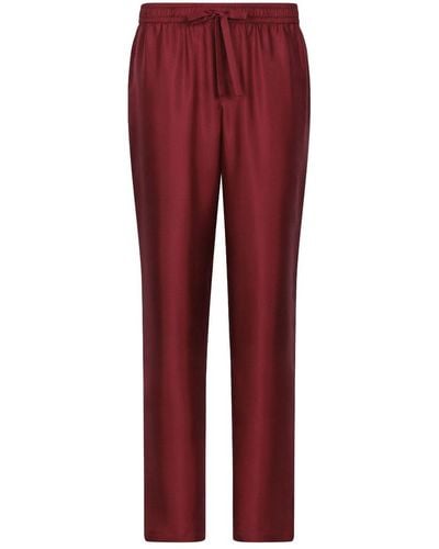 Dolce & Gabbana Pantalones DG Essentials con logo bordado - Rojo