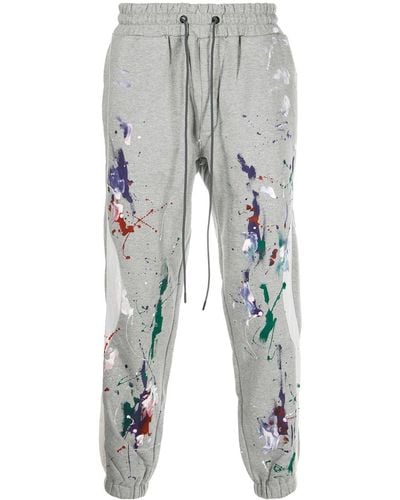 Mostly Heard Rarely Seen Pantalones joggers ajustados con salpicaduras de pintura - Gris