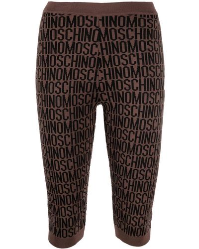 Moschino Leggins con monograma estampado - Marrón