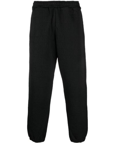 Moschino Pantalones de chándal con parche del logo - Negro