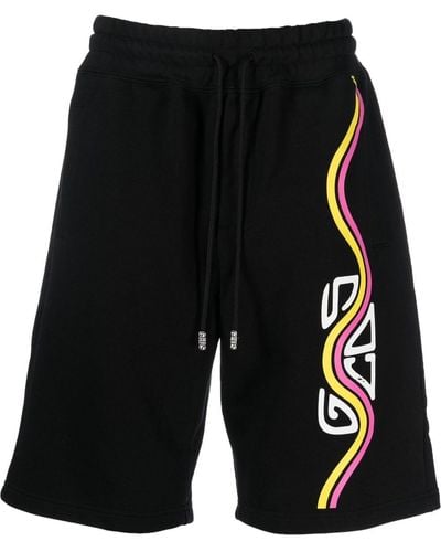 Gcds Pantalones cortos de deporte con logo estampado - Negro