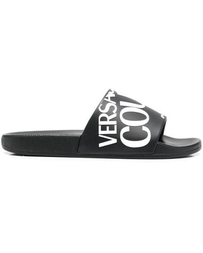 Versace Jeans Couture Chanclas planas con logo - Negro
