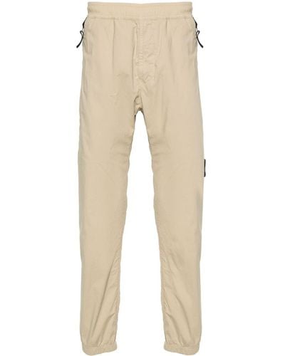 Stone Island Pantalones ajustados con distintivo Compass - Neutro