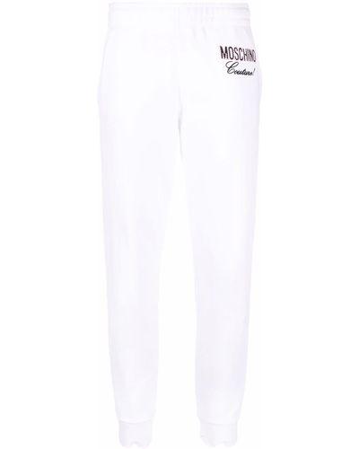 Moschino Pantalones de chándal con logo Couture bordado - Blanco