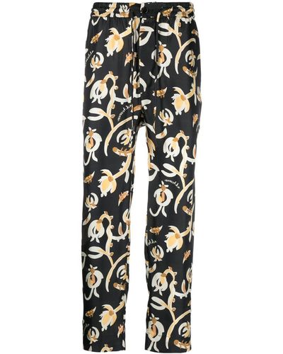 Nanushka Pantalones Jain con motivo floral - Negro