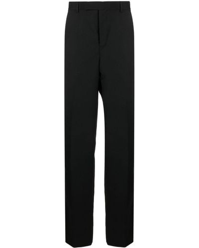 Versace Pantalon de costume en laine - Noir