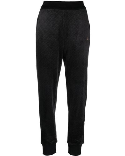 Moose Knuckles Pantalon de jogging Parsons à motif monogrammé en jacquard - Noir