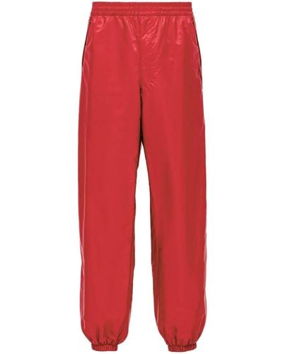 Prada Pantalon de jogging en nylon recyclé - Rouge