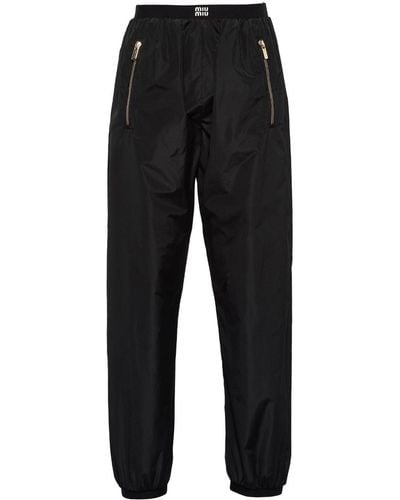 Miu Miu Pantalon de jogging à ceinture à logo - Noir