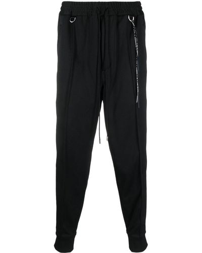 Mastermind Japan Pantalon de jogging fuselé à bande logo - Noir