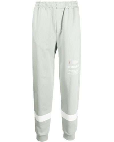 Helmut Lang Pantalon de jogging à logo imprimé - Gris