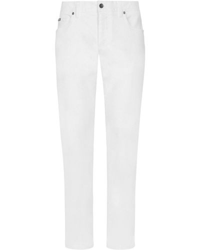 Dolce & Gabbana Jeans slim con placca logo - Bianco