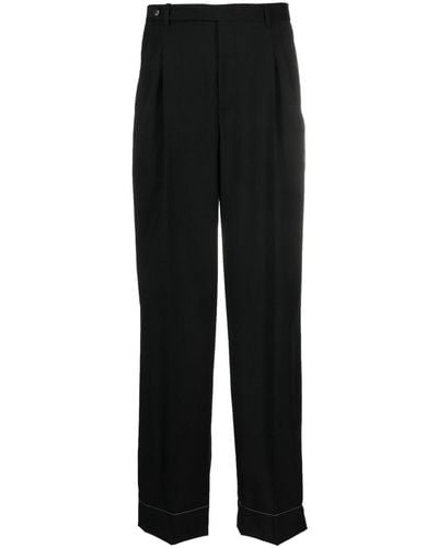 Brioni Pantalon de costume à design plissé - Noir