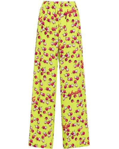 Palm Angels Cherries-patterned flared trousers - Jaune