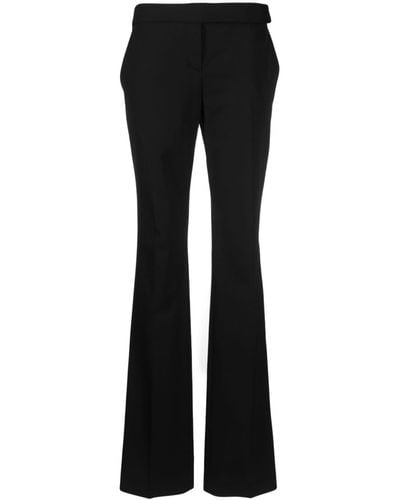Stella McCartney Pantalon de tailleur slim à plis marqués - Noir