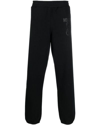 Moschino Pantalones con logo estampado - Negro