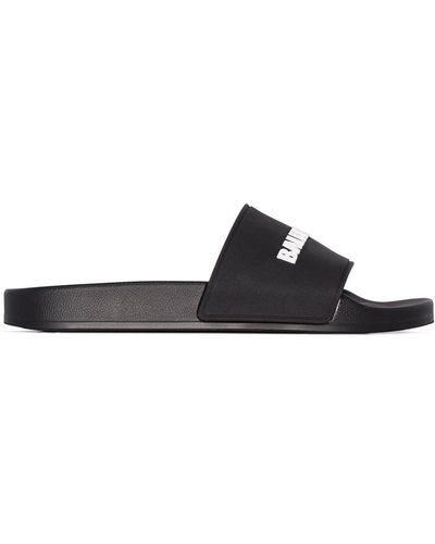 Balenciaga Sandali slides con logo goffrato - Nero