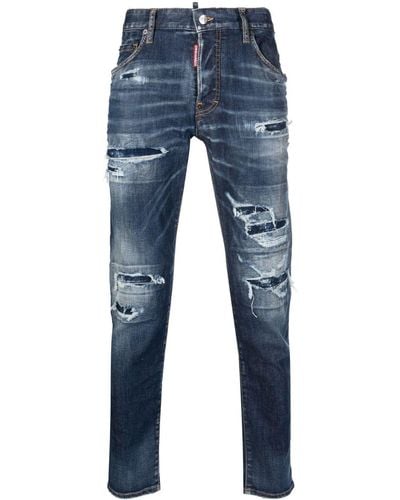 DSquared² Jeans a cinque tasche 'skater' con strappi ed effetto bleach in denim di cotone stretch azzurro - Blu