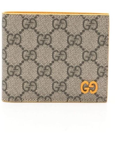 Gucci Portefeuille monogrammé à plaque logo GG - Gris