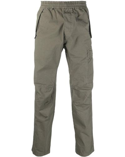 C.P. Company Pantalon à poches cargo - Gris