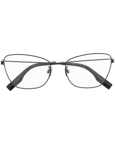 McQ Lunettes de vue à monture papillon - Marron