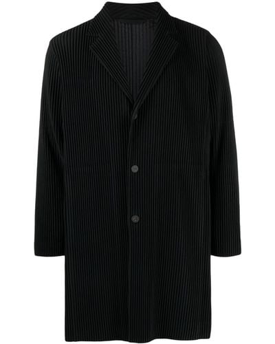 Issey Miyake Manteau long à design plissé - Noir