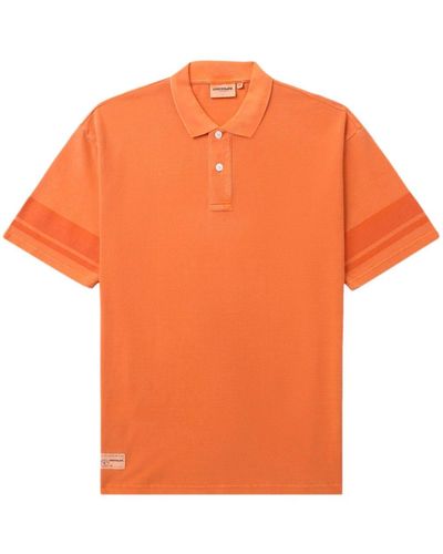 Chocoolate Polo en coton à logo imprimé - Orange