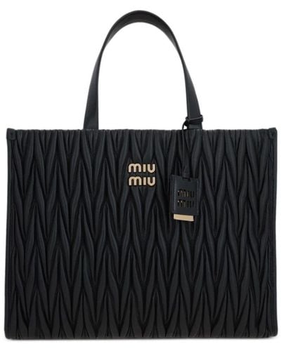 Miu Miu Handtasche aus Matelassé - Schwarz