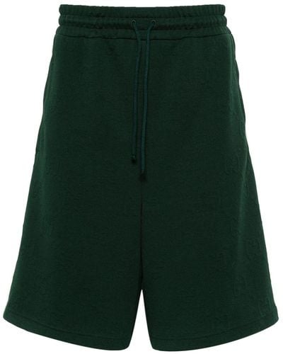 Gucci Pantalones cortos de deporte con motivo GG en jacquard - Verde